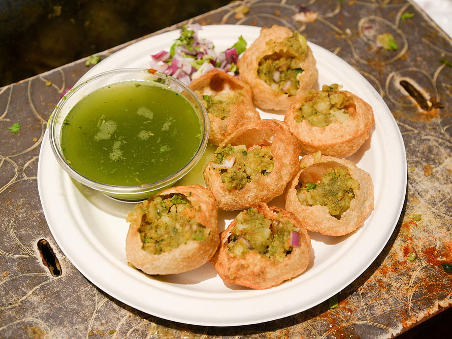 Traditional Indian Pani Puri with Spiced Potato Filling and Green Chutney HD wallpaper