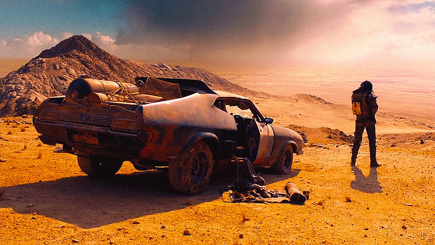 Mad Max Fury Road Wasteland Scene with Rusted Car and Lone Figure HD wallpaper