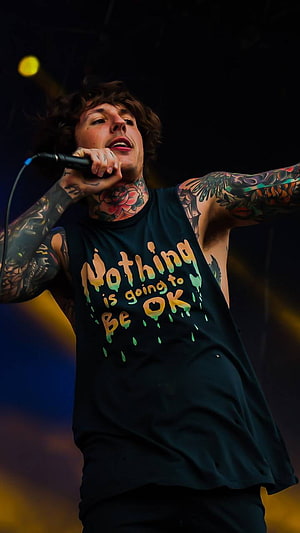 Oliver Sykes Live Concert Performance with Microphone and Stage Lighting HD phone wallpaper