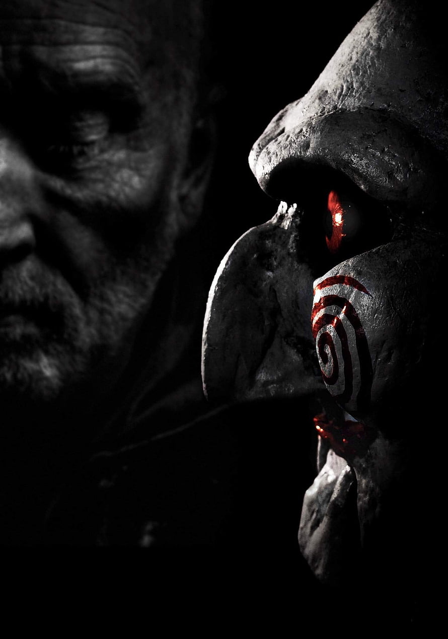 Jigsaw Mask with Glowing Red Eye and Spiral Mark in Dark Horror Scene HD phone wallpaper