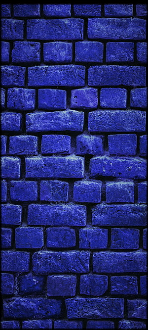 Deep Blue Brick Wall Texture with Dramatic Lighting and Rugged Surface Detail HD phone wallpaper