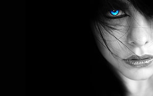 Dramatic Black and White Portrait with Glowing Blue Eye and Dark Hair HD wallpaper