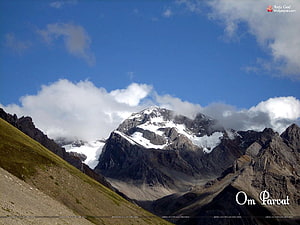 Mount Kailash Snow-Capped Peak with Clouds and Green Valley Landscape HD wallpaper