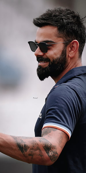 Virat Kohli Profile Portrait Wearing Sunglasses and Cricket Jersey HD phone wallpaper