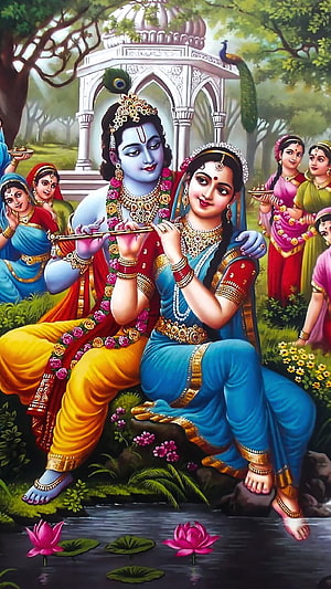 Radha Krishna Raslila: Divine Couple Playing Flute in a Lush Garden with Lotus Pond HD phone wallpaper