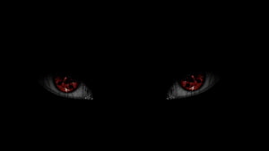Menacing Demon Eyes Glowing Red in Pitch Black Darkness HD wallpaper