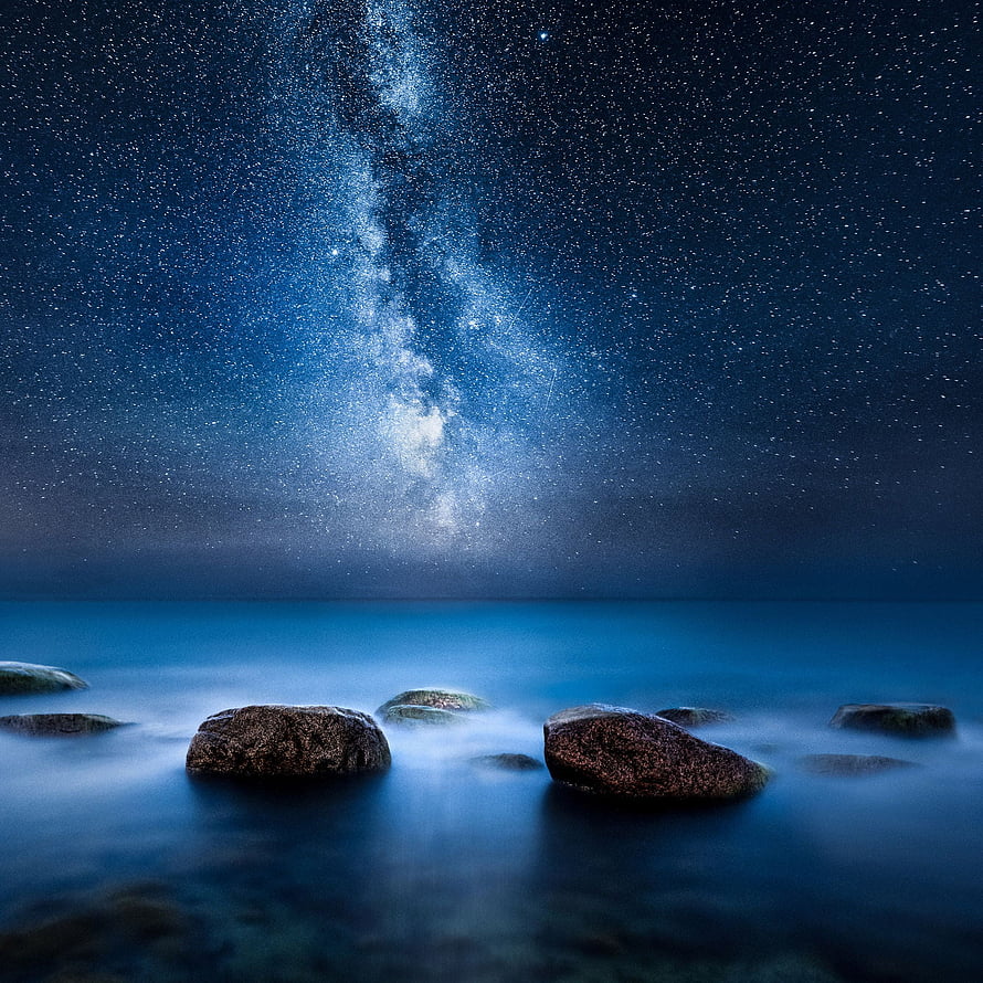 Milky Way Galaxy Rising Over Misty Ocean Rocks at Night HD phone wallpaper
