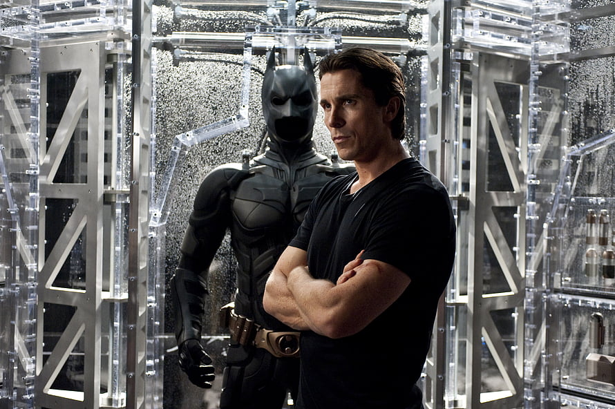 Christian Bale as Bruce Wayne and Batman in the Batcave from The Dark Knight HD wallpaper