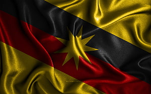 Sarawak State Flag Waving in Silk Fabric with Golden Star and Diagonal Bands HD wallpaper