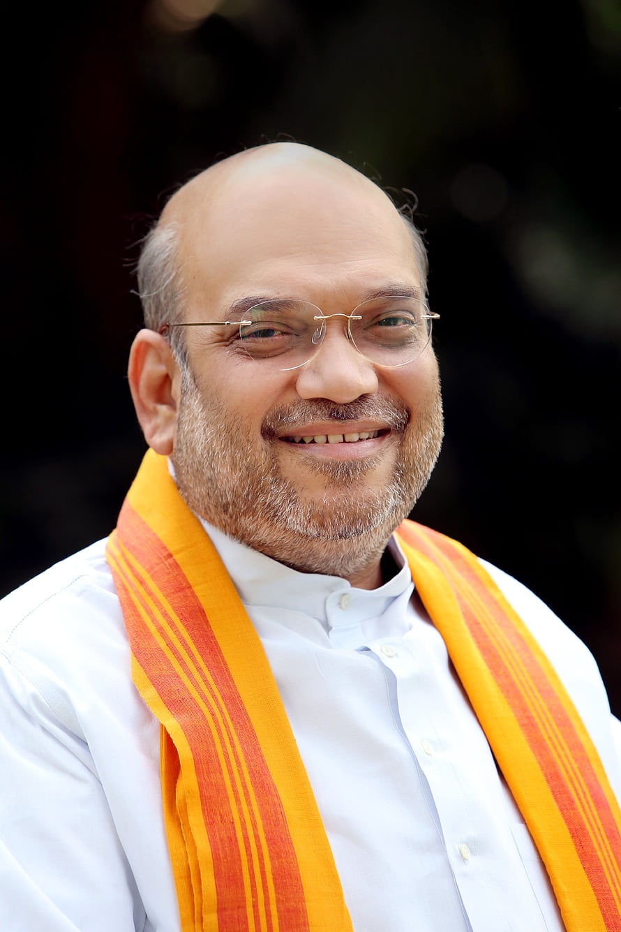 Amit Shah Portrait in White Kurta with Saffron and Orange Shawl HD phone wallpaper