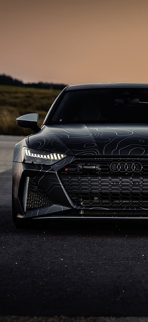 Audi RS7 Front Grille and Headlights at Sunset HD phone wallpaper