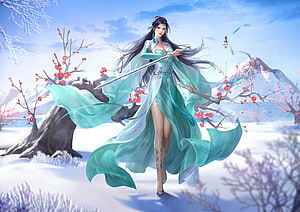 Elegant Fantasy Woman in Flowing Green Robe Holding Sword in Snowy Winter Landscape HD wallpaper
