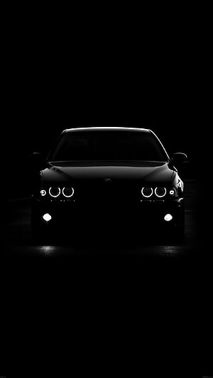 Black BMW M3 E46 Front View with Angel Eyes Headlights in Dark Studio Setting HD phone wallpaper