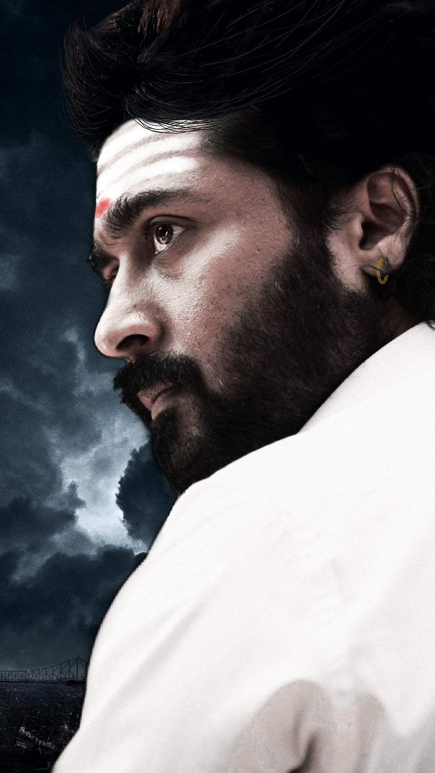Suriya Dramatic Profile Portrait Against Stormy Sky HD phone wallpaper