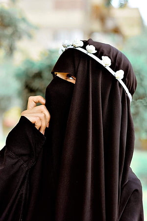 Woman in Black Niqab with White Floral Headband and Exposed Eye HD phone wallpaper