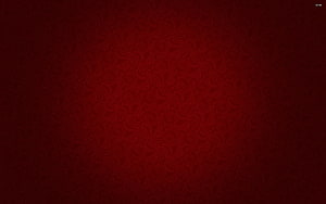 Royal Red Ornamental Pattern with Subtle Swirl Texture and Dark Vignette HD wallpaper