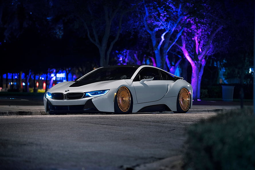 White BMW i8 with Gold Wheels Parked on a Street at Night with Neon Lighting HD wallpaper