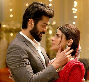 Shiddat Movie Still: Romantic Embrace in Traditional Indian Attire HD wallpaper