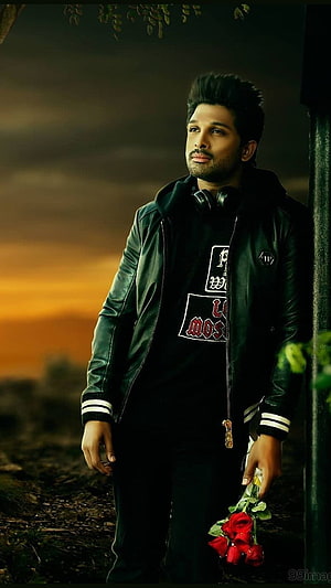 Allu Arjun in Black Leather Jacket Holding Red Roses at Sunset HD phone wallpaper