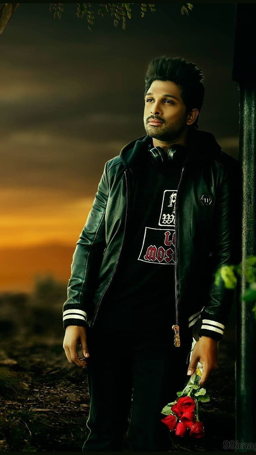 Allu Arjun in Black Leather Jacket Holding Red Roses at Sunset HD phone wallpaper