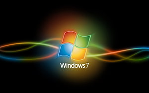 Windows 7 Logo with Glowing Colorful Light Trails on Black Background HD wallpaper