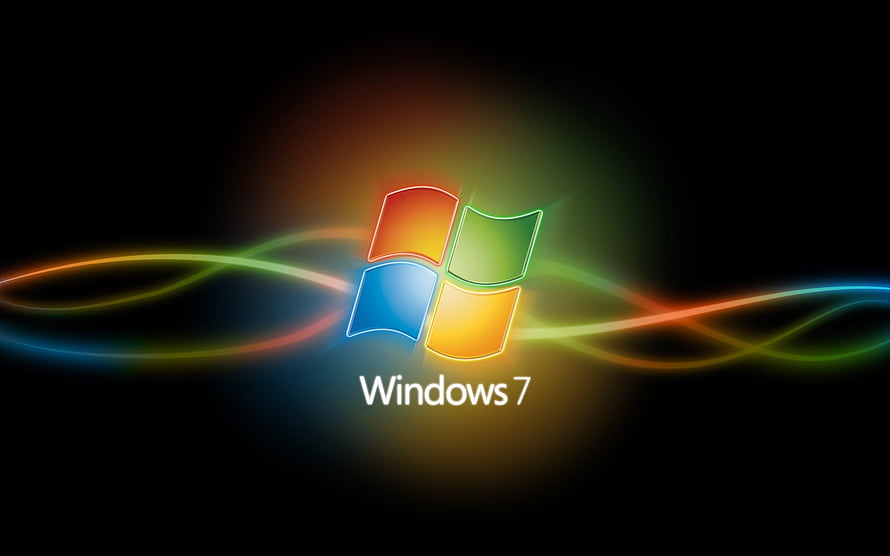 Windows 7 Logo with Glowing Colorful Light Trails on Black Background HD wallpaper
