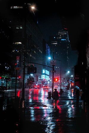 Moody New York City Street Scene on a Rainy Night with Neon Reflections HD phone wallpaper