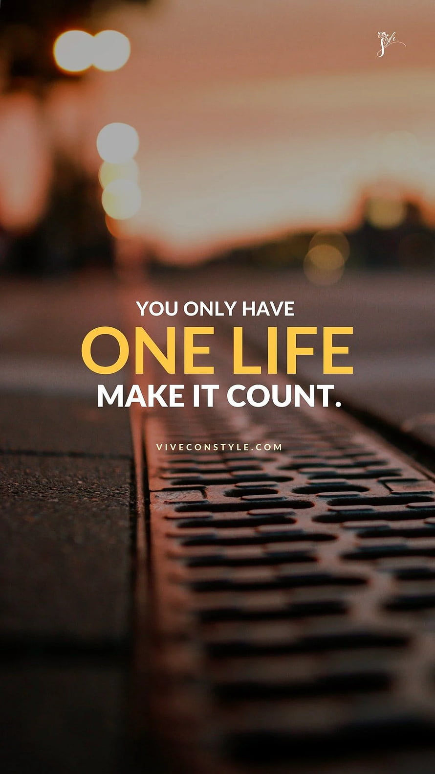 Inspirational Life Quote on Sunset Road with Metal Grate and Bokeh Lights HD phone wallpaper