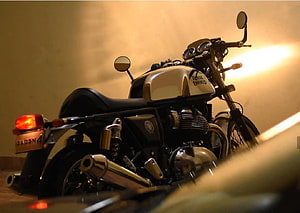 Royal Enfield Continental GT 650 Cafe Racer Motorcycle in Warm Studio Lighting HD wallpaper