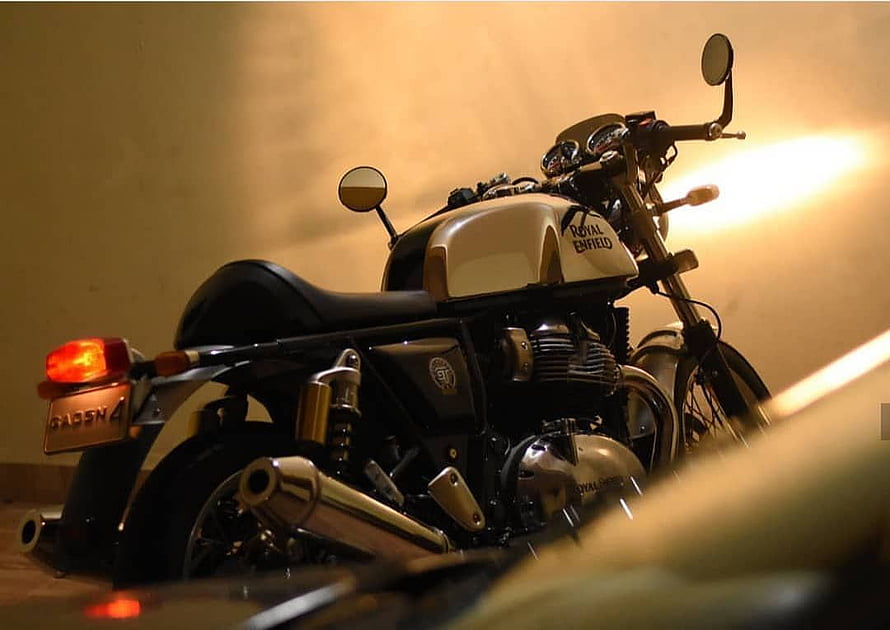 Royal Enfield Continental GT 650 Cafe Racer Motorcycle in Warm Studio Lighting HD wallpaper