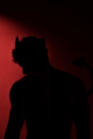 Devil Silhouette Portrait Against Deep Red Backdrop HD phone wallpaper
