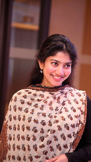 Sai Pallavi in a Floral Patterned Saree with a Warm Smile HD phone wallpaper