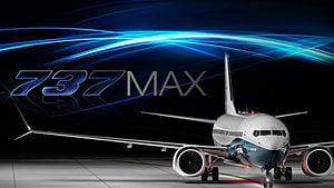 Boeing 737 MAX Commercial Jetliner on Dark Tarmac with Blue Light Trails HD wallpaper