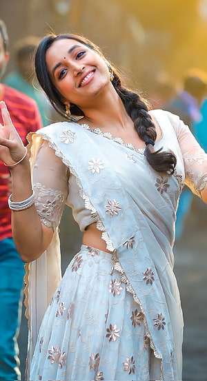 Srinidhi Shetty in a Light Blue Embroidered Saree with Floral Motifs and Gold Trim HD phone wallpaper