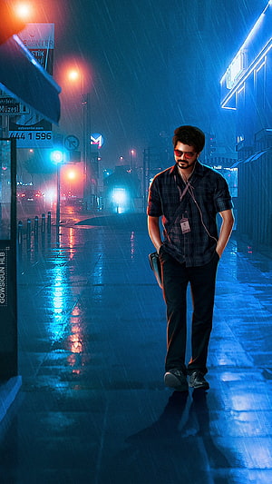 Vijay Walking Through Neon-Lit Rainy City Street at Night HD phone wallpaper