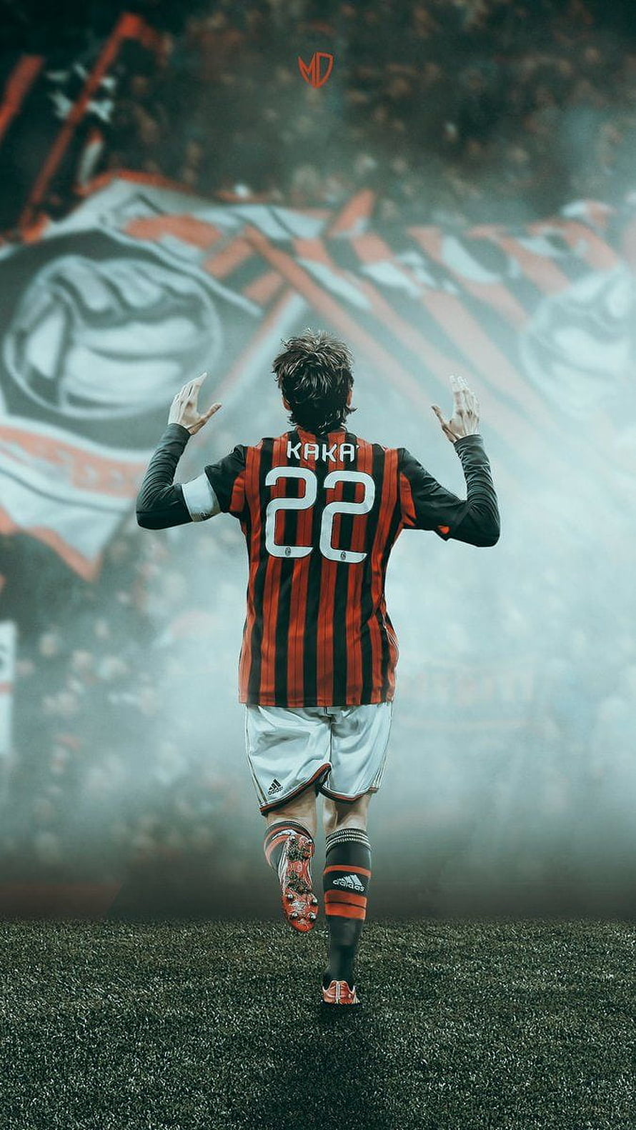 Kaka in AC Milan Striped Kit Celebrating on the Pitch with Stadium Banners in Background HD phone wallpaper