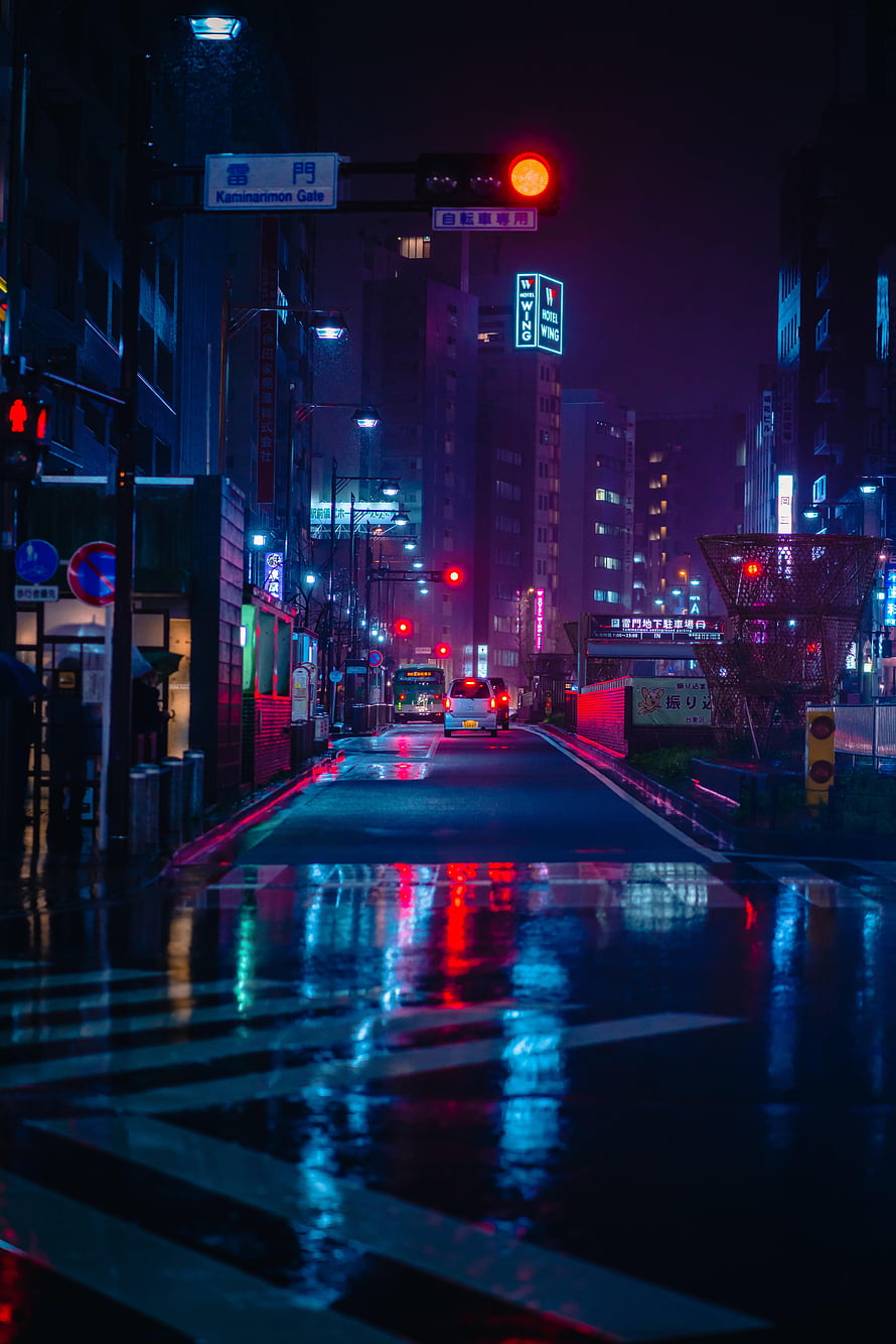 Rainy Night Street in Kamimairimon with Neon Reflections and Wet Asphalt HD phone wallpaper