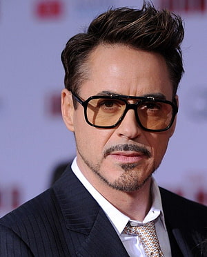 Robert Downey Jr in Dark Suit and Amber Aviator Sunglasses at Red Carpet Event HD phone wallpaper