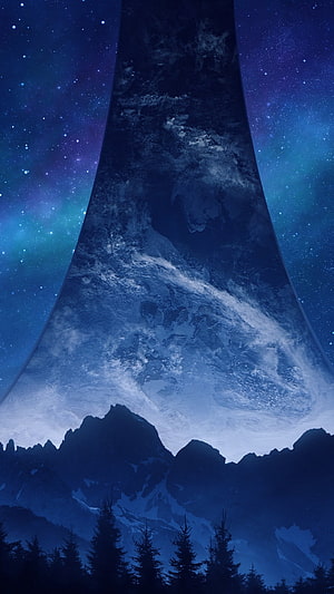 Halo Monolith Tower Rising Over Snowy Mountains Under a Starry Night Sky HD phone wallpaper