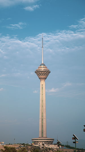 Milad Tower in Tehran, Iran: A Modern Landmark Against a Blue Sky HD phone wallpaper