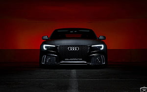 Black Audi RS5 Front View With LED Headlights Against Red Background HD wallpaper