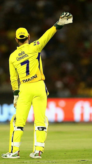 MS Dhoni in CSK Yellow Jersey Acknowledging the Crowd at Cricket Stadium HD phone wallpaper