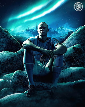 Erling Haaland in Manchester City Kit Seated on Rocks Under Aurora Sky HD phone wallpaper