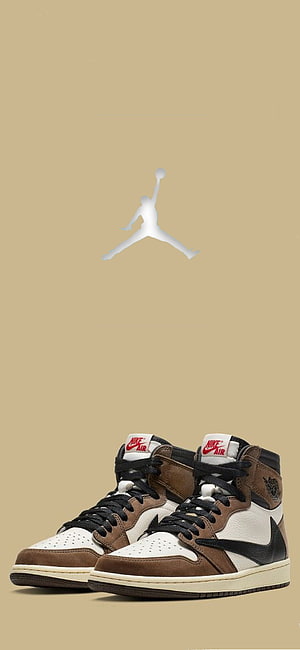 Travis Scott x Air Jordan 1 High OG in Brown, White, and Black on Tan Background HD phone wallpaper