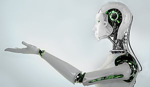 White humanoid robot with exposed green mechanical internals in profile view HD wallpaper