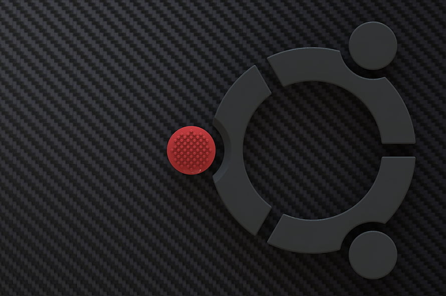 Ubuntu Operating System Logo on Carbon Fiber ThinkPad Laptop Surface HD wallpaper