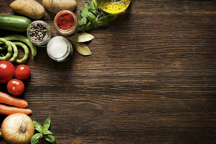 Rustic Wooden Table With Fresh Vegetables, Spices, and Herbs Arranged Along the Edge HD wallpaper
