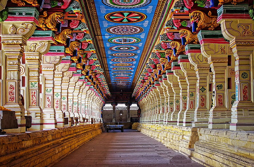 Ornate Pillared Corridor of a Traditional Tamil Temple in India HD wallpaper