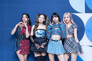 Blackpink Members Jisoo Lisa Jennie and Rosé Posing in Plaid Outfits Against Blue Backdrop HD wallpaper