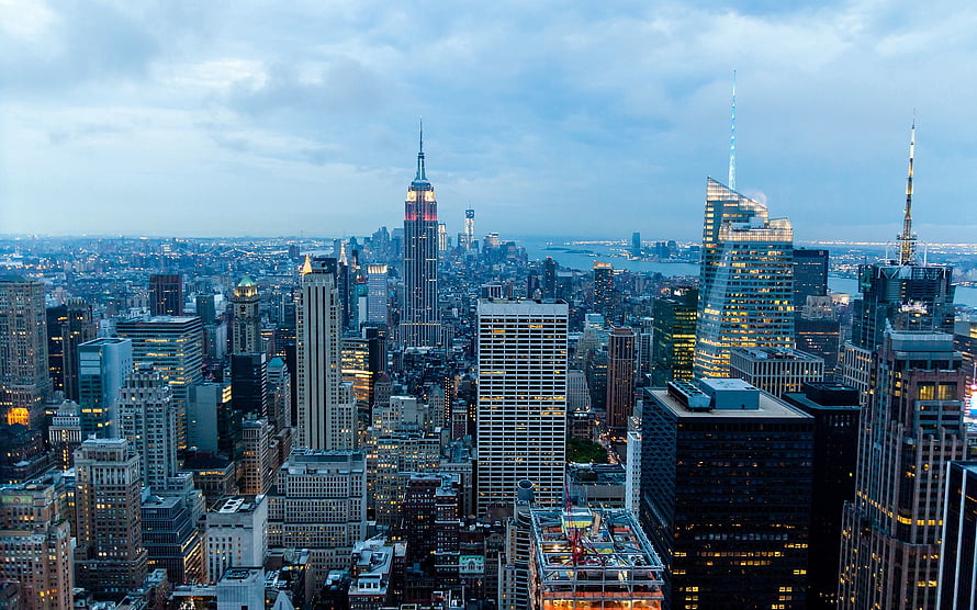 Aerial View of New York City Skyline at Dusk Featuring the Empire State Building HD wallpaper